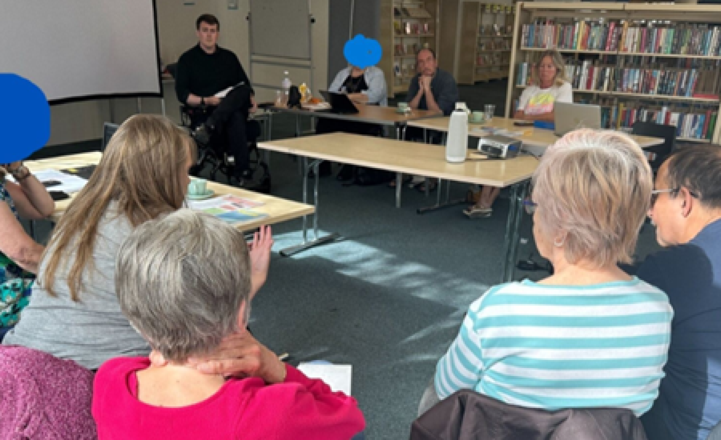 A group of people in discussion.