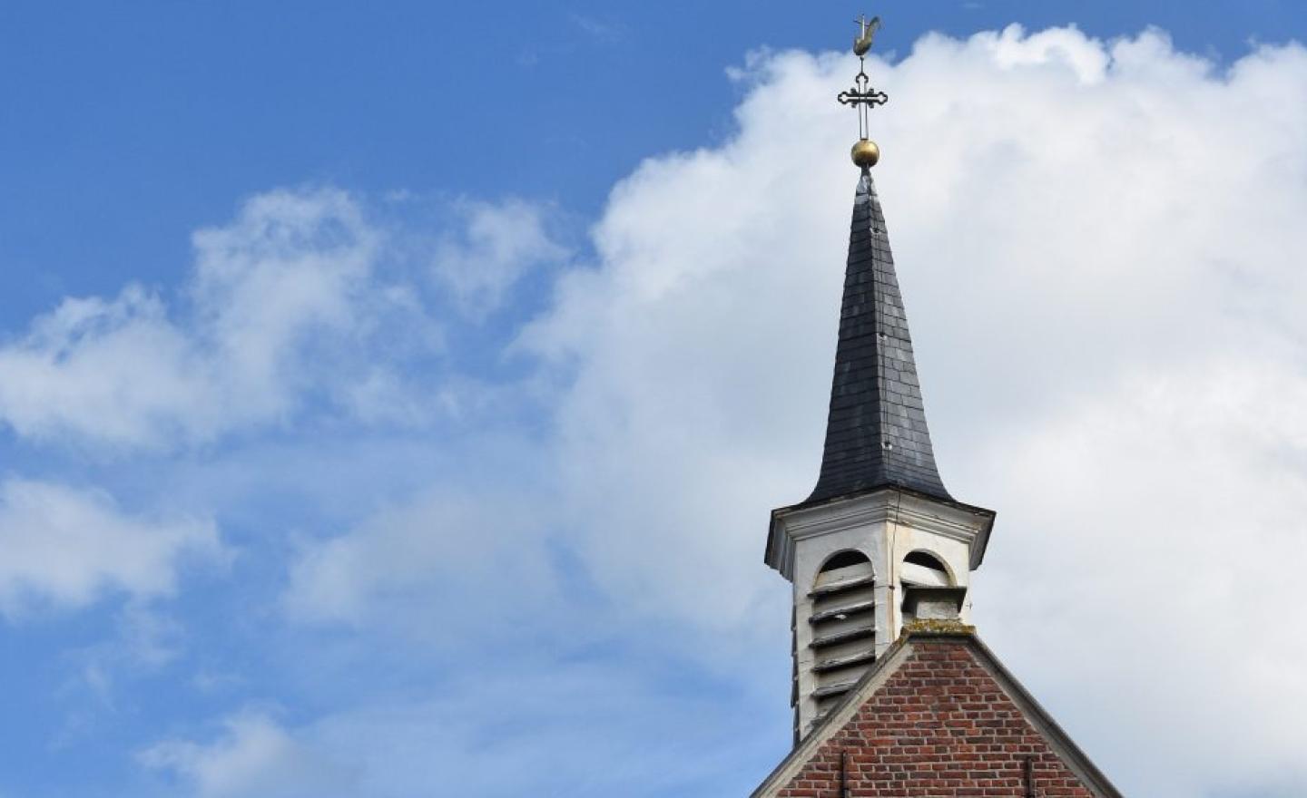 Blue sky and religious building top