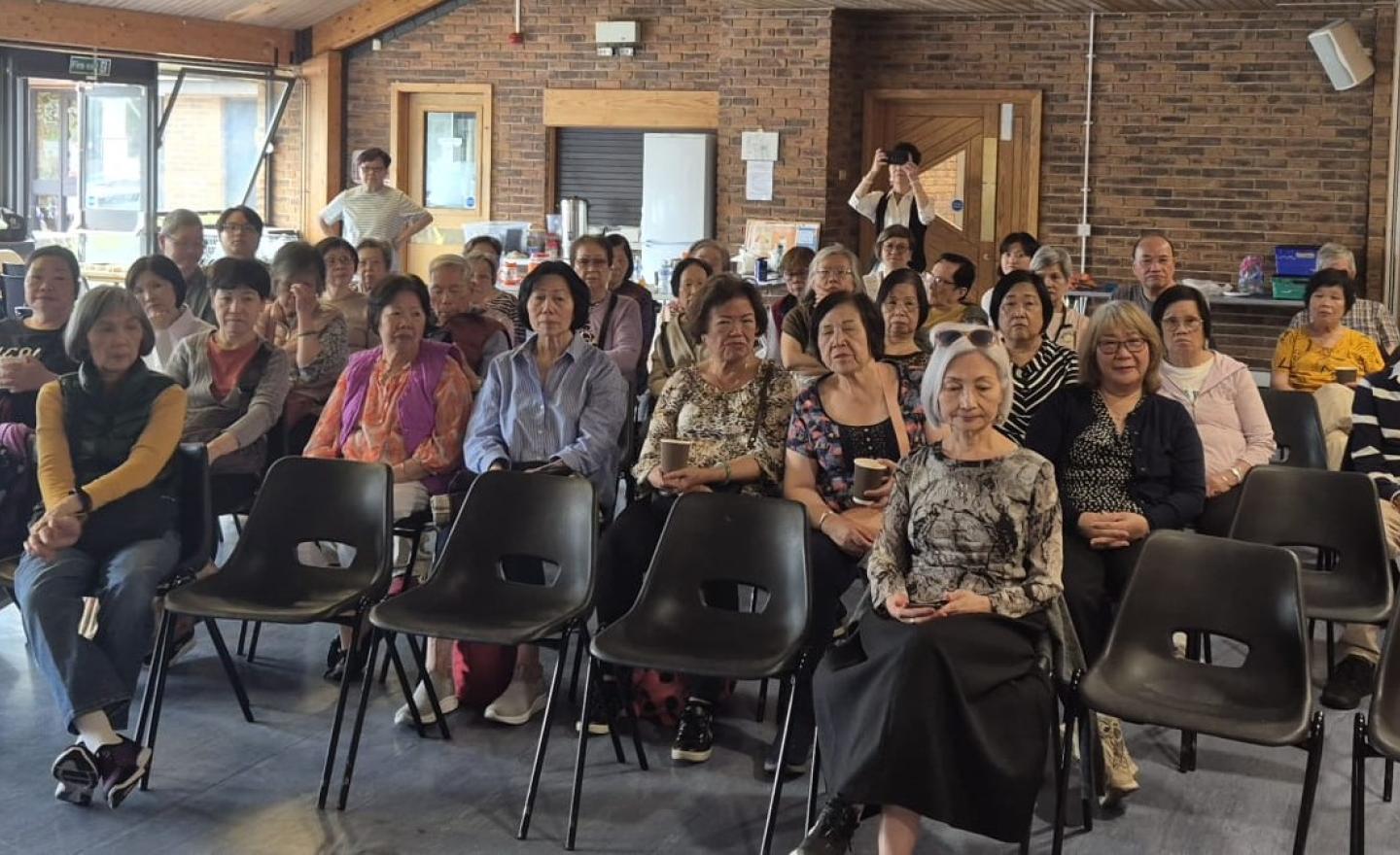 A group of East and Southeast Asian people attending a workshop on civic and democratic participation 